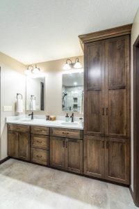 Spacious master bathroom with custom wood cabinetry in a Brookwood residence in Fort Wayne, Indiana