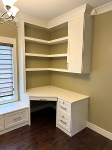 Custom built-in corner desk with upper shelving and drawers in a Brookwood home in Fort Wayne, Indiana